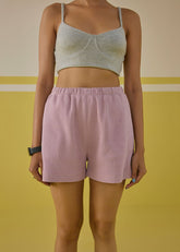 A Model Wearing Multicolor Organic Cotton Lavender Sun Shorts / Soul Sun, curated by Only Ethikal